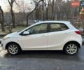 Белый Мазда 2, объемом двигателя 1.5 л и пробегом 130 тыс. км за 7500 $, фото 1 на Automoto.ua