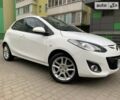 Білий Мазда 2, об'ємом двигуна 1.5 л та пробігом 63 тис. км за 9800 $, фото 1 на Automoto.ua