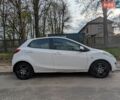 Білий Мазда 2, об'ємом двигуна 1.5 л та пробігом 194 тис. км за 8700 $, фото 1 на Automoto.ua