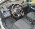 Білий Мазда 2, об'ємом двигуна 1.5 л та пробігом 151 тис. км за 7800 $, фото 4 на Automoto.ua