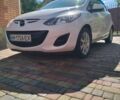Білий Мазда 2, об'ємом двигуна 1.5 л та пробігом 151 тис. км за 7800 $, фото 1 на Automoto.ua