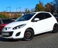 Білий Мазда 2, об'ємом двигуна 1.5 л та пробігом 106 тис. км за 8499 $, фото 2 на Automoto.ua