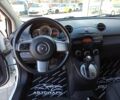 Білий Мазда 2, об'ємом двигуна 1.5 л та пробігом 106 тис. км за 8499 $, фото 16 на Automoto.ua