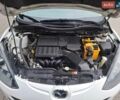 Білий Мазда 2, об'ємом двигуна 1.5 л та пробігом 151 тис. км за 8700 $, фото 33 на Automoto.ua
