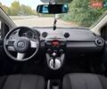 Білий Мазда 2, об'ємом двигуна 1.5 л та пробігом 151 тис. км за 8700 $, фото 14 на Automoto.ua