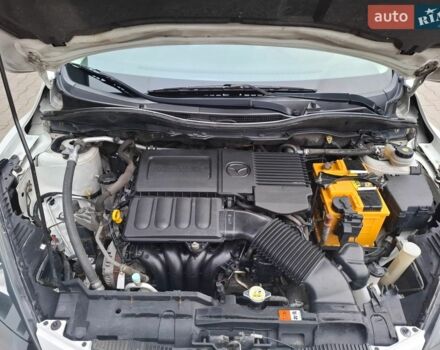 Білий Мазда 2, об'ємом двигуна 1.5 л та пробігом 151 тис. км за 8700 $, фото 34 на Automoto.ua