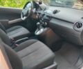 Білий Мазда 2, об'ємом двигуна 1.5 л та пробігом 151 тис. км за 7800 $, фото 5 на Automoto.ua