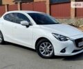 Білий Мазда 2, об'ємом двигуна 1.5 л та пробігом 75 тис. км за 12800 $, фото 1 на Automoto.ua