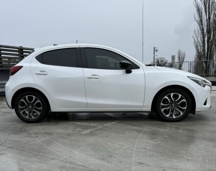 Белый Мазда 2, объемом двигателя 1.5 л и пробегом 75 тыс. км за 273 $, фото 2 на Automoto.ua