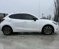 Белый Мазда 2, объемом двигателя 1.5 л и пробегом 75 тыс. км за 273 $, фото 2 на Automoto.ua