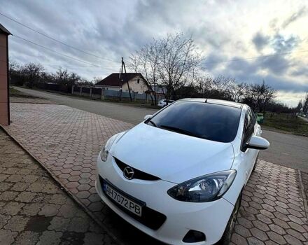 Белый Мазда 2, объемом двигателя 1.3 л и пробегом 200 тыс. км за 4800 $, фото 1 на Automoto.ua
