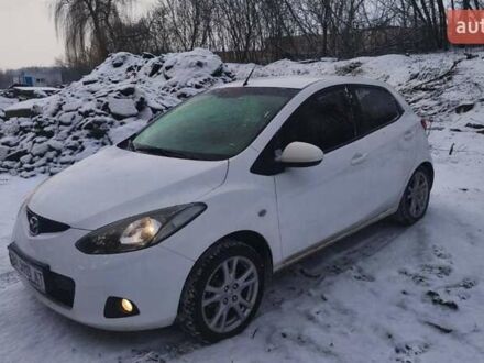 Белый Мазда 2, объемом двигателя 1.5 л и пробегом 170 тыс. км за 5500 $, фото 1 на Automoto.ua