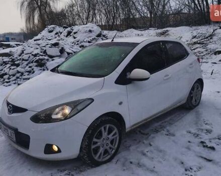 Білий Мазда 2, об'ємом двигуна 1.5 л та пробігом 170 тис. км за 5500 $, фото 1 на Automoto.ua