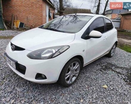 Белый Мазда 2, объемом двигателя 1.5 л и пробегом 165 тыс. км за 5550 $, фото 1 на Automoto.ua