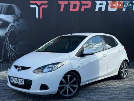 Білий Мазда 2, об'ємом двигуна 1.4 л та пробігом 245 тис. км за 4300 $, фото 1 на Automoto.ua