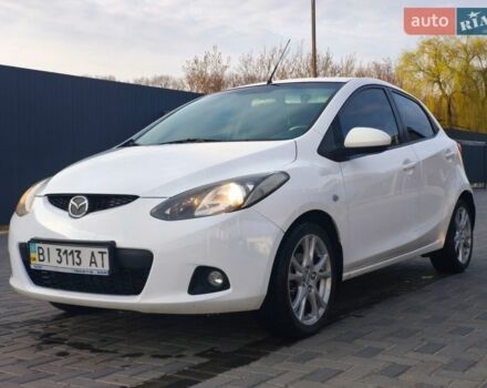 Белый Мазда 2, объемом двигателя 1.5 л и пробегом 165 тыс. км за 5200 $, фото 1 на Automoto.ua