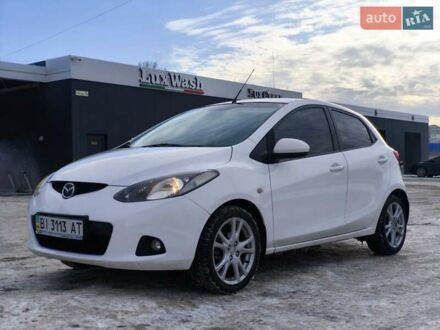 Білий Мазда 2, об'ємом двигуна 1.5 л та пробігом 165 тис. км за 5500 $, фото 1 на Automoto.ua