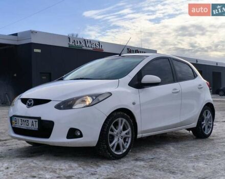 Белый Мазда 2, объемом двигателя 1.5 л и пробегом 165 тыс. км за 5500 $, фото 1 на Automoto.ua