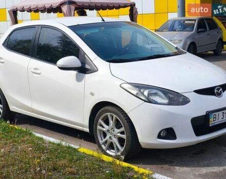 Белый Мазда 2, объемом двигателя 1.5 л и пробегом 165 тыс. км за 5300 $, фото 1 на Automoto.ua