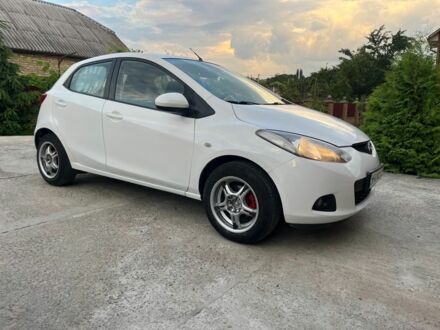 Білий Мазда 2, об'ємом двигуна 1.5 л та пробігом 250 тис. км за 5150 $, фото 1 на Automoto.ua