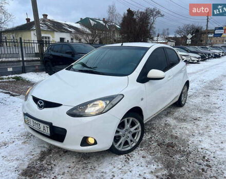 Білий Мазда 2, об'ємом двигуна 1.5 л та пробігом 170 тис. км за 5800 $, фото 1 на Automoto.ua