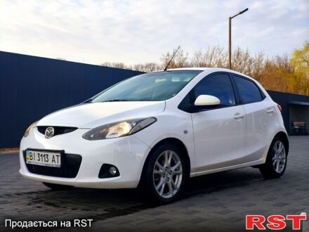 Белый Мазда 2, объемом двигателя 1.5 л и пробегом 170 тыс. км за 5300 $, фото 1 на Automoto.ua