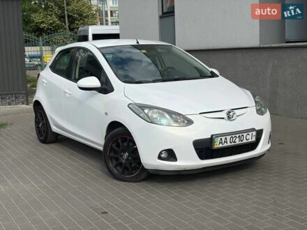 Білий Мазда 2, об'ємом двигуна 1.5 л та пробігом 81 тис. км за 6700 $, фото 1 на Automoto.ua