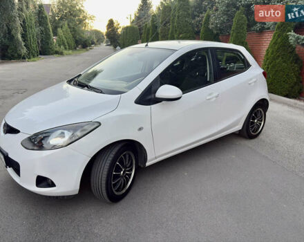 Белый Мазда 2, объемом двигателя 1.5 л и пробегом 124 тыс. км за 6800 $, фото 1 на Automoto.ua