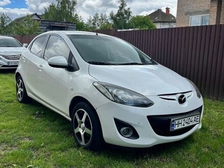 Білий Мазда 2, об'ємом двигуна 1.5 л та пробігом 139 тис. км за 7700 $, фото 1 на Automoto.ua