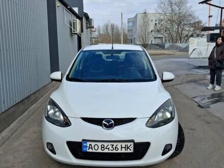Білий Мазда 2, об'ємом двигуна 1.4 л та пробігом 121 тис. км за 5500 $, фото 1 на Automoto.ua