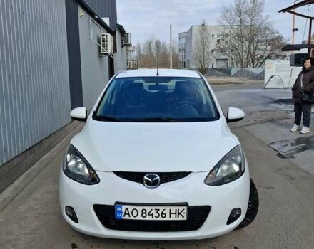 Белый Мазда 2, объемом двигателя 1.4 л и пробегом 121 тыс. км за 5500 $, фото 1 на Automoto.ua