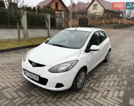 Белый Мазда 2, объемом двигателя 1.4 л и пробегом 221 тыс. км за 5000 $, фото 1 на Automoto.ua