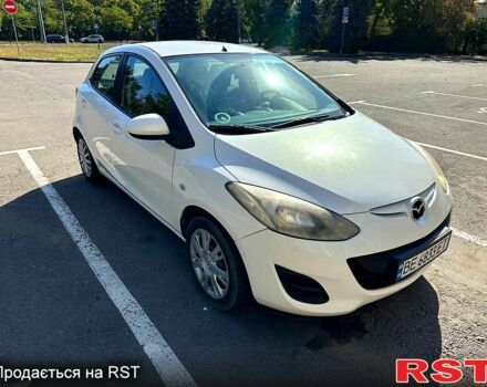 Білий Мазда 2, об'ємом двигуна 1.3 л та пробігом 270 тис. км за 5000 $, фото 1 на Automoto.ua