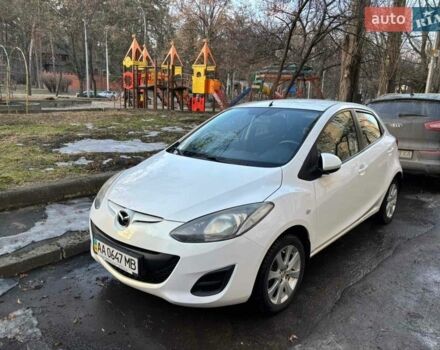 Белый Мазда 2, объемом двигателя 1.5 л и пробегом 130 тыс. км за 7500 $, фото 1 на Automoto.ua