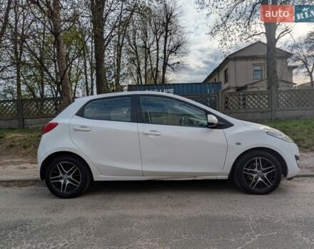 Белый Мазда 2, объемом двигателя 1.5 л и пробегом 194 тыс. км за 8700 $, фото 1 на Automoto.ua