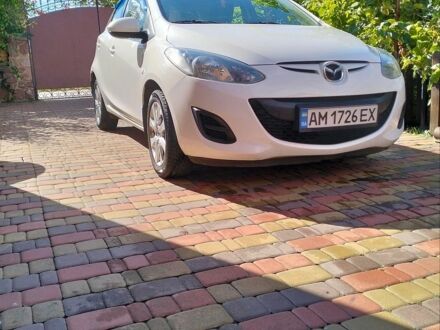Білий Мазда 2, об'ємом двигуна 1.5 л та пробігом 151 тис. км за 7800 $, фото 1 на Automoto.ua