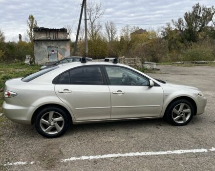 Бежевый Мазда 2, объемом двигателя 2 л и пробегом 310 тыс. км за 3200 $, фото 1 на Automoto.ua