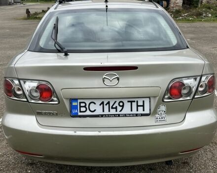 Бежевый Мазда 2, объемом двигателя 2 л и пробегом 310 тыс. км за 3200 $, фото 2 на Automoto.ua