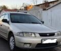 Бежевый Мазда 2, объемом двигателя 1 л и пробегом 634 тыс. км за 1936 $, фото 1 на Automoto.ua