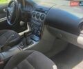 Черный Мазда 2, объемом двигателя 2 л и пробегом 315 тыс. км за 3600 $, фото 3 на Automoto.ua