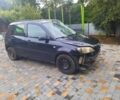 Черный Мазда 2, объемом двигателя 1.2 л и пробегом 200 тыс. км за 1300 $, фото 1 на Automoto.ua