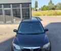 Чорний Мазда 2, об'ємом двигуна 1.4 л та пробігом 260 тис. км за 1700 $, фото 7 на Automoto.ua