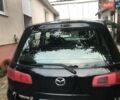 Чорний Мазда 2, об'ємом двигуна 1.2 л та пробігом 210 тис. км за 3600 $, фото 1 на Automoto.ua