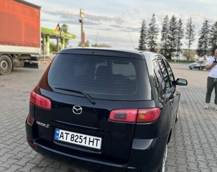 Чорний Мазда 2, об'ємом двигуна 1.2 л та пробігом 190 тис. км за 3500 $, фото 13 на Automoto.ua