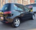 Чорний Мазда 2, об'ємом двигуна 1.4 л та пробігом 260 тис. км за 1700 $, фото 5 на Automoto.ua