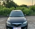 Черный Мазда 2, объемом двигателя 1.1 л и пробегом 260 тыс. км за 1850 $, фото 1 на Automoto.ua