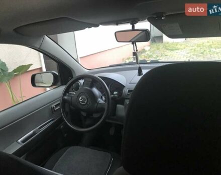Черный Мазда 2, объемом двигателя 0 л и пробегом 210 тыс. км за 3600 $, фото 1 на Automoto.ua