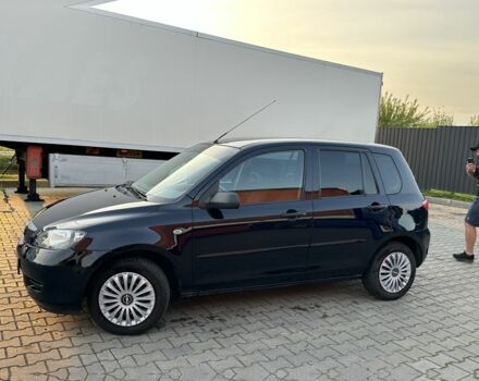 Чорний Мазда 2, об'ємом двигуна 1.2 л та пробігом 190 тис. км за 3500 $, фото 2 на Automoto.ua
