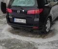Черный Мазда 2, объемом двигателя 1.4 л и пробегом 250 тыс. км за 4030 $, фото 3 на Automoto.ua