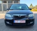 Чорний Мазда 2, об'ємом двигуна 1.4 л та пробігом 260 тис. км за 1700 $, фото 1 на Automoto.ua